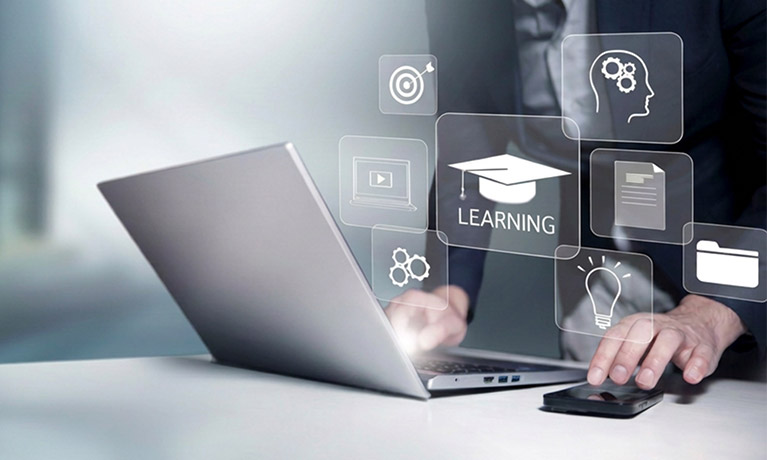 Digital image of a man using a laptop, surrounded by digital icons.