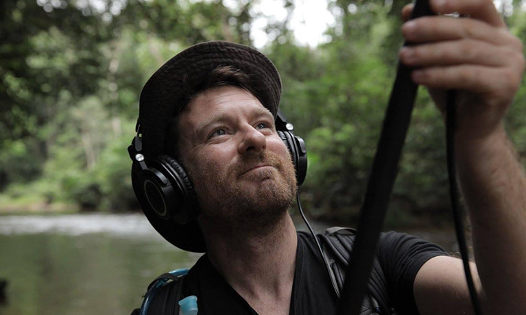 David Hamill operating a boom mic