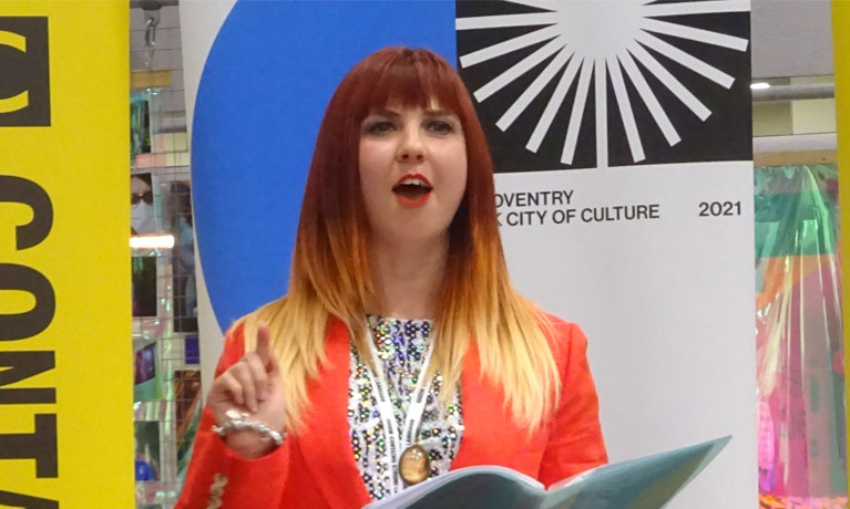 Emilie reading poetry aloud