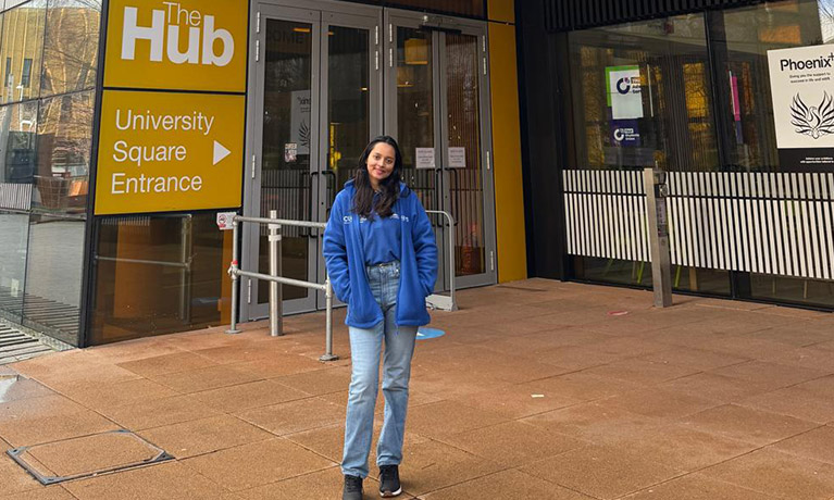 Gimhani Karunaratne standing at the entrance of the Student Hub