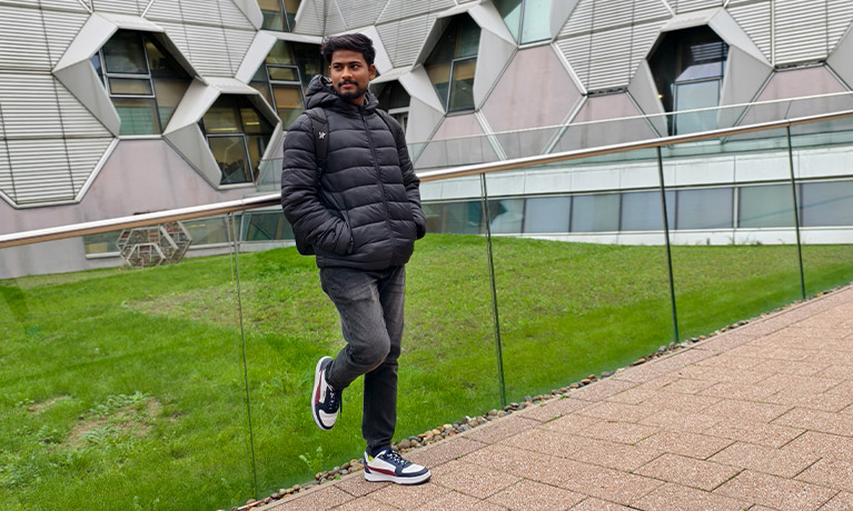 Gopi Parasuraman  standing infront of the Frank Whittle building