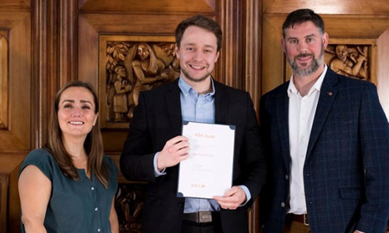 Matthew at 66 Portland Place in London, graduating from the RIBA Studio Part I Architecture course.