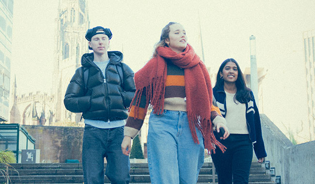 Students walking together in Coventry City centre
