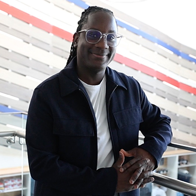 James smiling at the camera