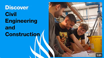 Three students working in a workshop space