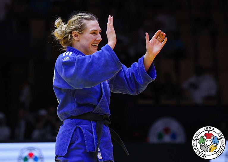 Emma Reid cheering during a Judo match