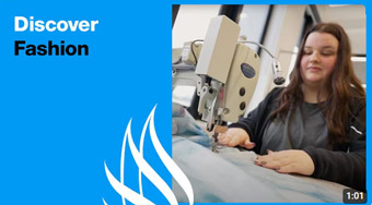 A student working on a sewing machine