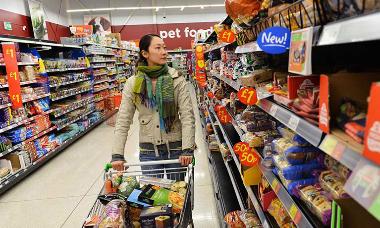 A woman shopping in a supermarket