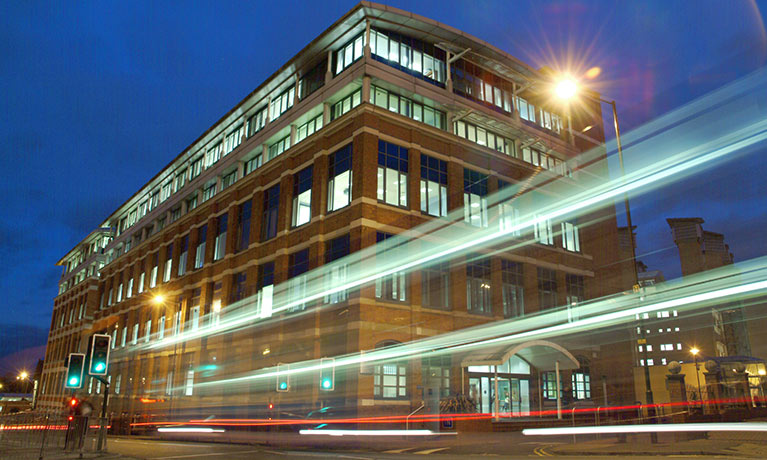 Coventry University's William Morris building at night