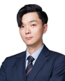 Portrait of Daniel Han against a white background