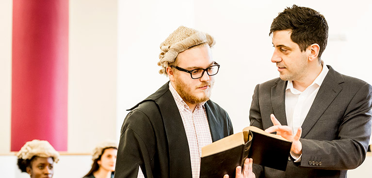 Student and lecturer in the Moot Room