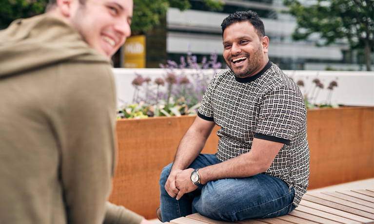 Students laughing on campus