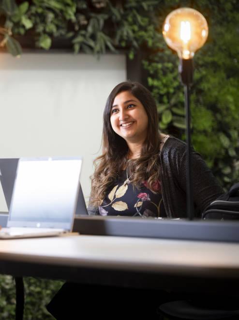 two women talking during a job interview in a relaxed ambient