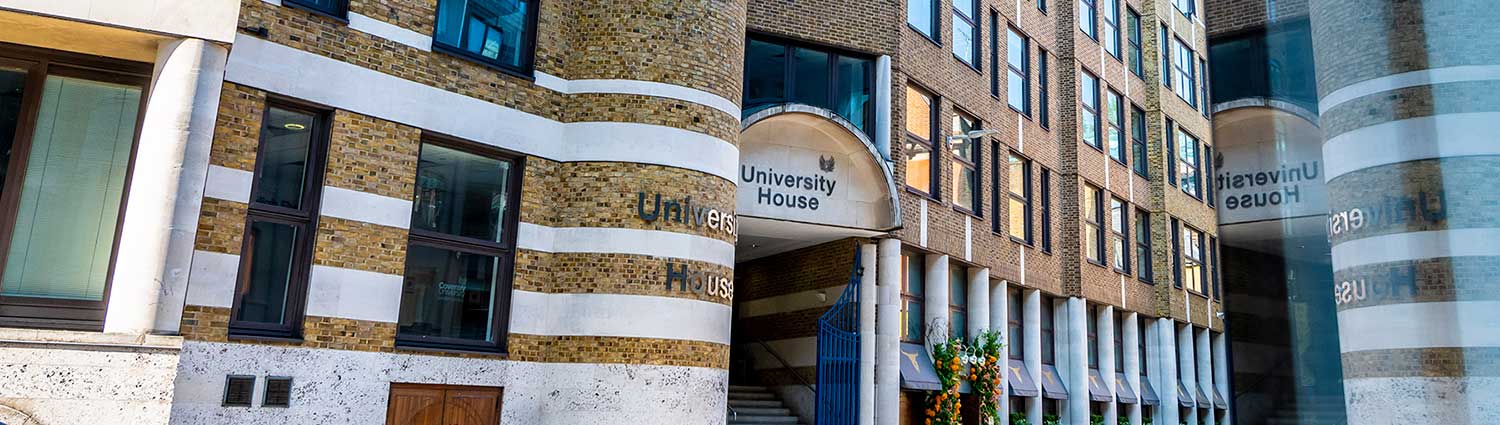 University House and its reflection in the bulding opposite