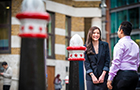 Two students chatting near London campus