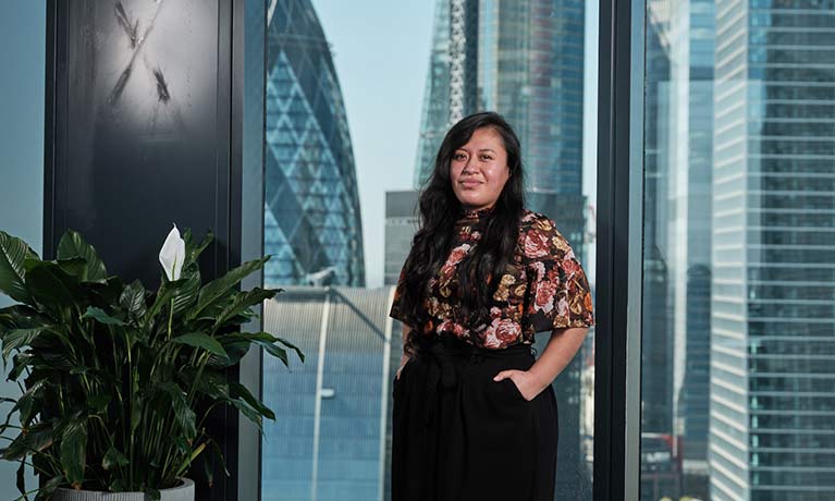 Joselyn Moreno Cajamarca with London skyline in the background 