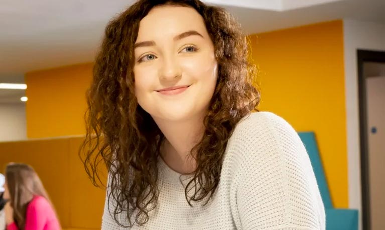 Female student smiling at the camera