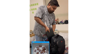 student packing their bag for the day