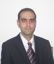 Dr Omid Razmkhah portrait with plain background