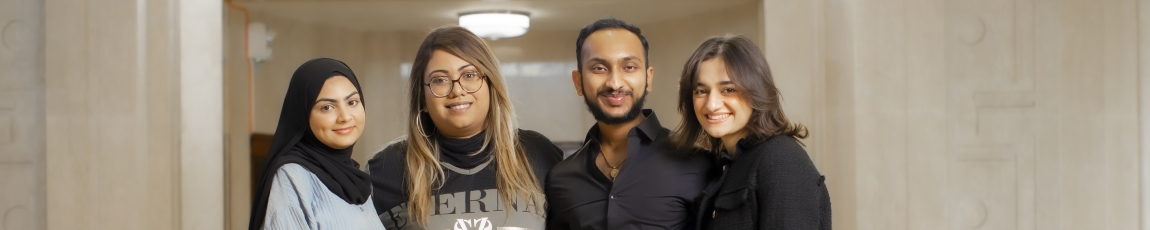 Four students stood in corridor