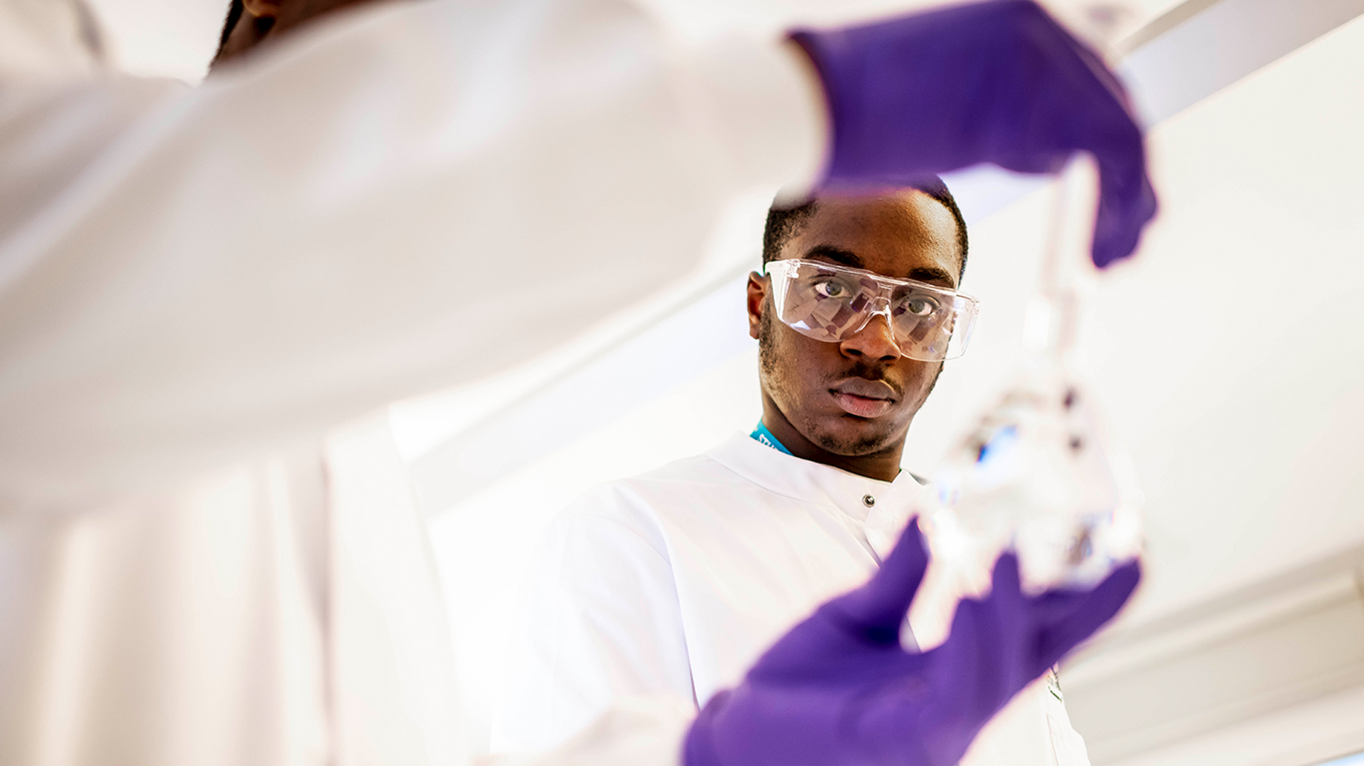 Two Applied Biosciences students working in a laboratory