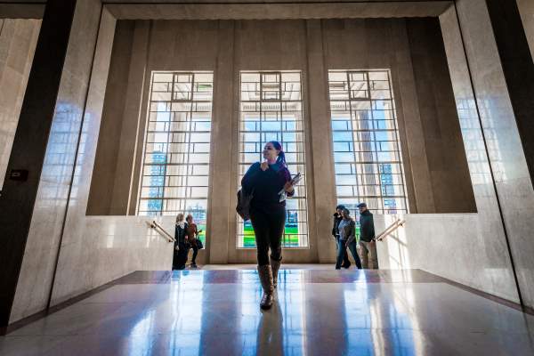 Student walking into a university building