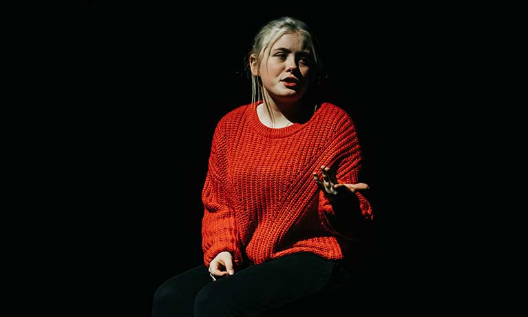 Heather Taylor on stage acting