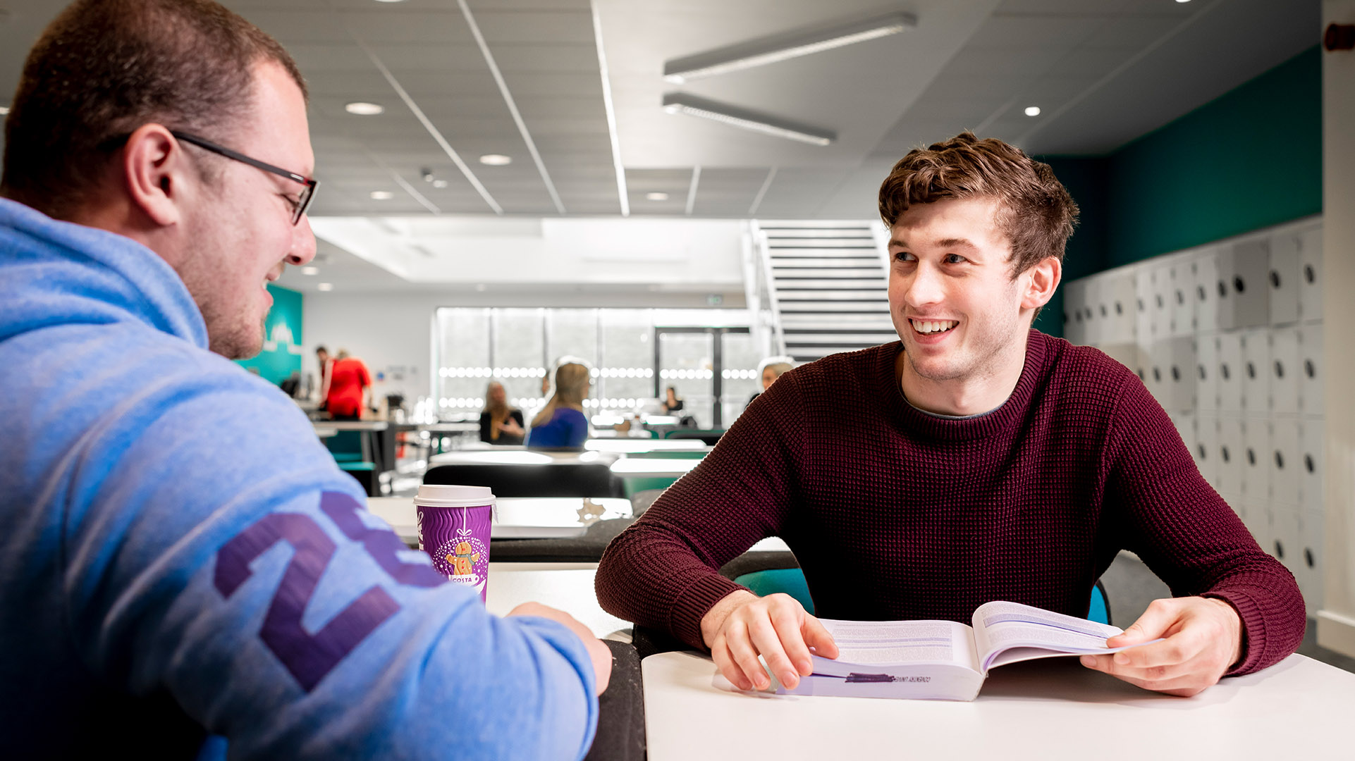 Business students studying together in the library