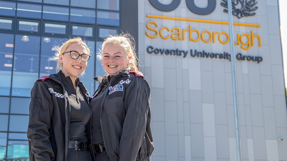 Two Professional Policing students outside the Scarborough campus