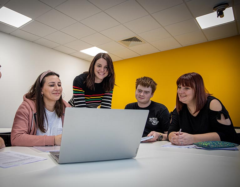 Students sitting together in a social space