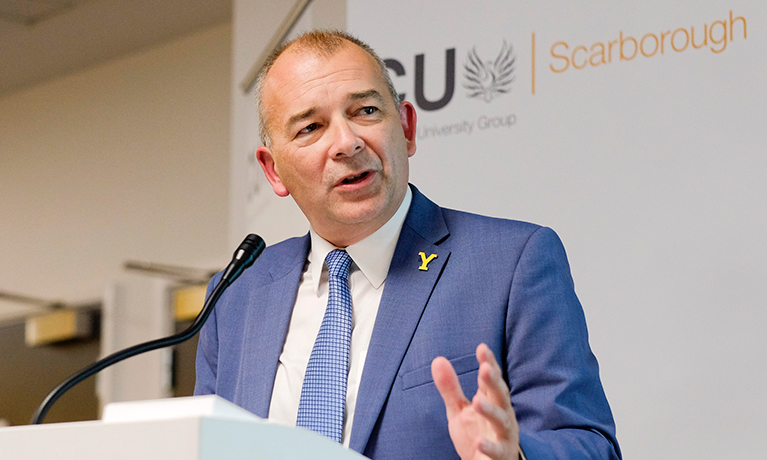John Latham speaking at CU Scarborough's opening in 2015