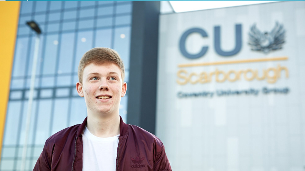 Computing Science student outside the CU Scarborough campus building