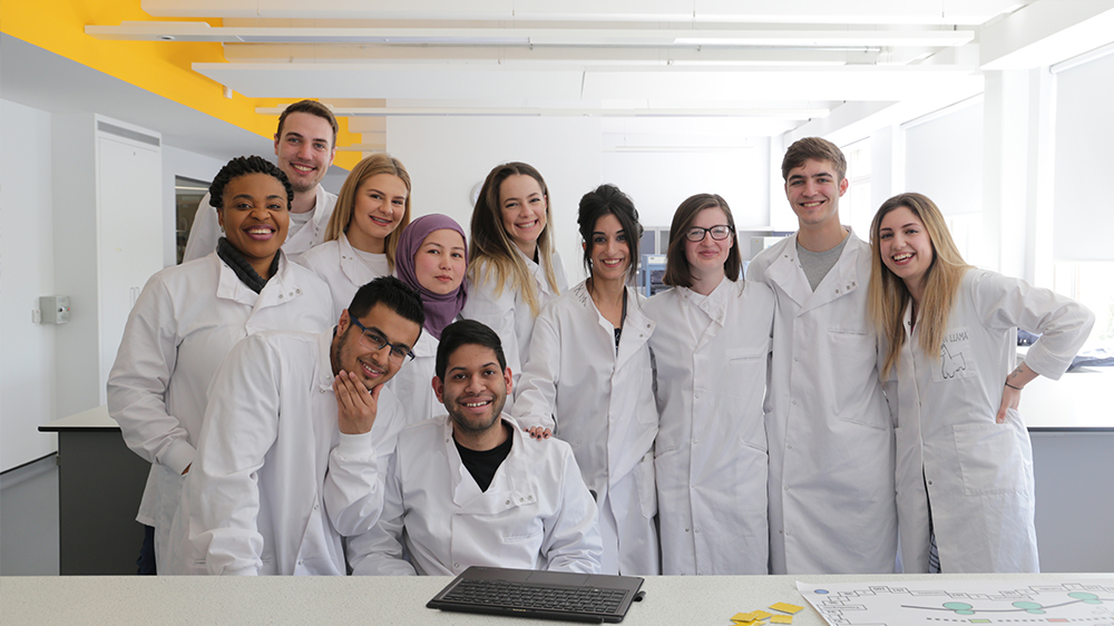 Students assembled in a lab