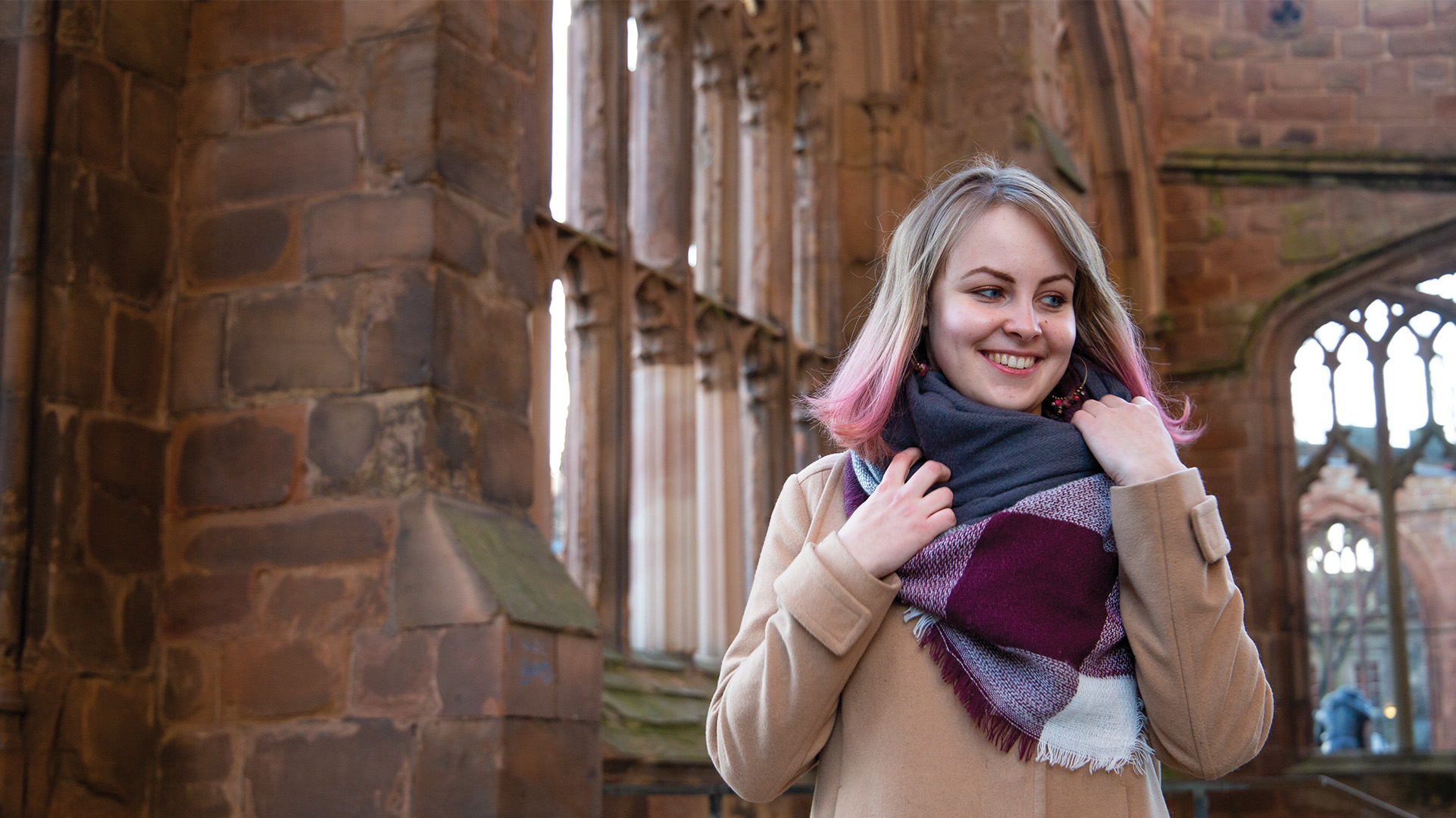 Student in the Coventry Cathedral ruins