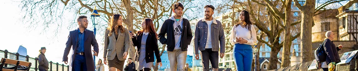 Group of students walking through London