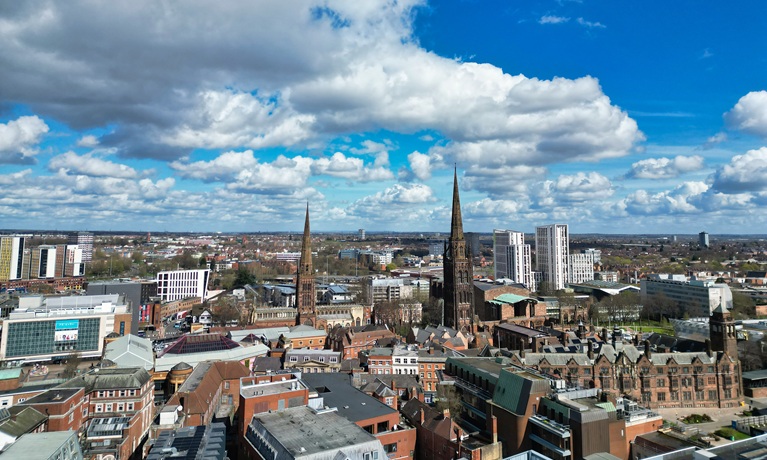 Coventry city centre skyline with blues skies