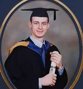 Alex Richardson in his graduation gown