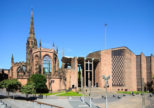 The new Coventry Cathedral and the cathedral ruins side by side.