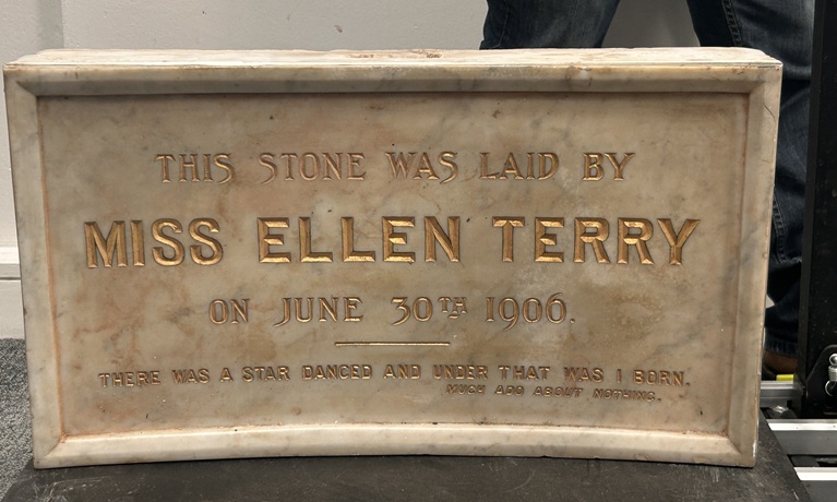 The marble foundation stone laid by Dame Ellen Terry in 1906