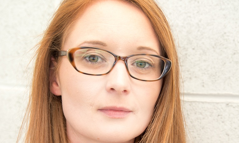 Headshot of Jenna Ward wearing glasses