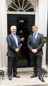 Two men standing outside No.10