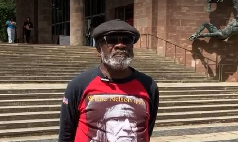 The Specials guitarist Lynval Golding stood outside Coventry Cathedral