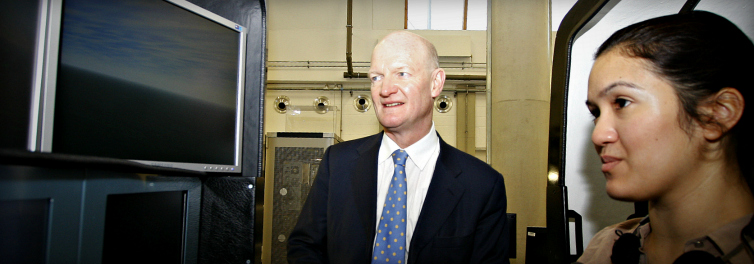 David Willetts being shown around an engineering and computing university building