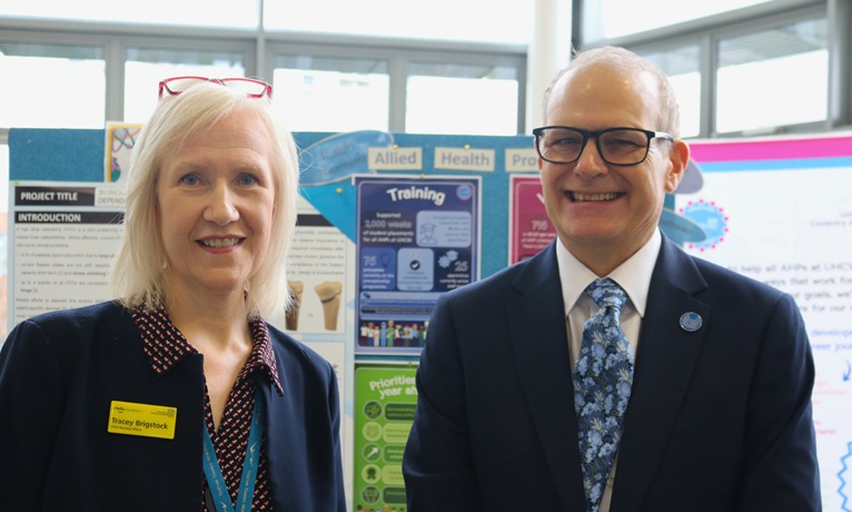 Professor Richard Dashwood and UHCW's Tracey Brigstock stood next to each other smiling at the camera
