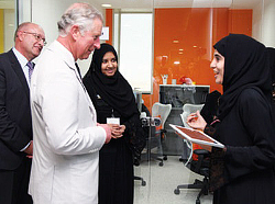 HRH The Prince of Wales talking to two women