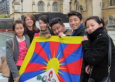A group of students holding a flag
