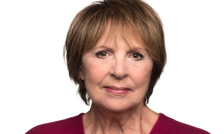 A head and shoulders picture of Dame Penelope Wilton with a white background