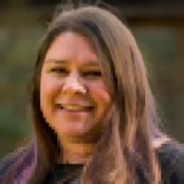 A headshot of Elaine Coe