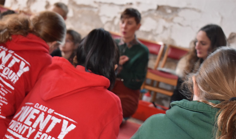 A teacher with a class of students