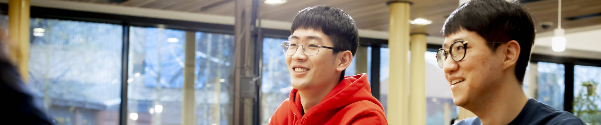 Picture of a man sitting down and smiling